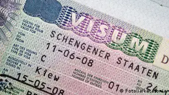#31025476 - Close-up page of passport with Schengen visa © katatonia