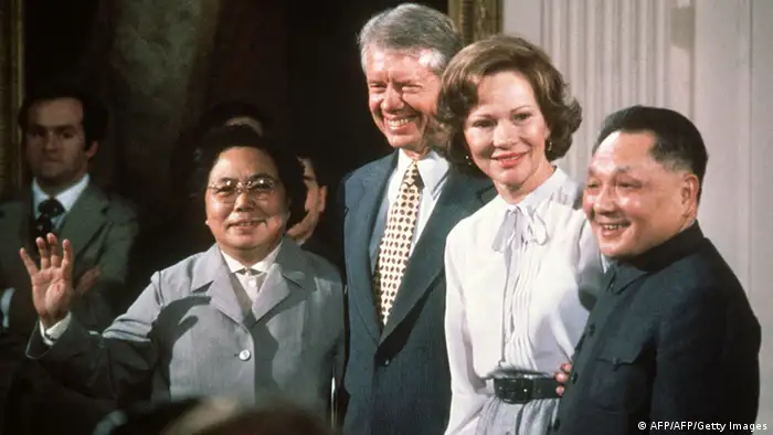 WASHINGTON, : File photo dated 31 January, 1979 shows from right: Chinese modernizer Deng Xiaoping, US First Lady Rosalyn Carter, US President Jimmy Carter and Deng's wife, smiling fo rthe media at the White House in Washington D.C. during the Chinese leader's visit to the US. Jimmy Carter was awarded the Nobel Peace Prize 11 October, 2002. A commitment to human rights and the alleviation of human suffering was not only a guiding principle of his single, four-year term as 39th president of the United States, but the cornerstone of The Carter Center he founded 20 years ago to pursue his vision of world diplomacy. AFP PHOTO (Photo credit should read AFP/AFP/Getty Images)