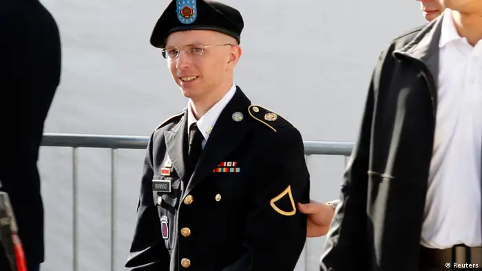 U.S. Army Private First Class Bradley Manning (C) is escorted in handcuffs as he leaves the courthouse in Fort Meade, Maryland, in this June 6, 2012 file photo. The court martial trial of Manning, who is accused of orchestrating the biggest leak of classified information in U.S. history through the WikiLeaks anti-secrecy website two years ago, began June 3, 2013. REUTERS/Jose Luis Magana/Files (UNITED STATES - Tags: MILITARY CRIME LAW SCIENCE TECHNOLOGY)