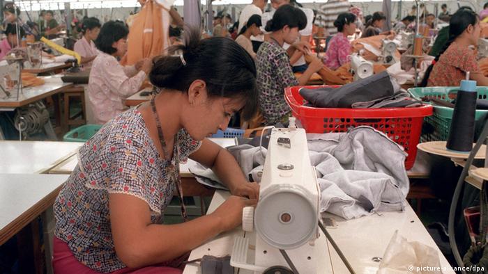 A woman sews at a factory in Myanmar.