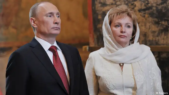 Vladimir Putin (L) and his wife, Lyudmila, attend a service, conducted by the Patriarch of Moscow and All Russia Kirill, to mark the start of his term as Russia's new president at the Kremlin in Moscow in this May 7, 2012 file photo. Russian President Putin and his wife said on state television on June 6, 2013 that they had separated and their marriage was over after 20 years. REUTERS/Aleksey Nikolskyi/RIA Novosti/Pool/Files (RUSSIA - Tags: POLITICS RELIGION) ATTENTION EDITORS - THIS IMAGE WAS PROVIDED BY A THIRD PARTY. THIS PICTURE IS DISTRIBUTED EXACTLY AS RECEIVED BY REUTERS, AS A SERVICE TO CLIENTS