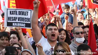 Protesters shout slogans as they take part in a demonstration in the center of Ankara on June 8, 2013. Thousands of angry Turks poured into the streets on June 8 to join mass anti-government protests as the crisis entered it's ninth day, defying Prime Minister Recep Tayyip Erdogan's call to end the worst civil unrest of his decade-long rule. AFP PHOTO / ADEM ALTAN (Photo credit should read ADEM ALTAN/AFP/Getty Images)