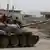 Ein Panzer der syrischen Armee in der lange Zeit heftig umkämpften Stadt Kusair (Foto: Str/AFP/Getty Images)