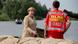 German Chancellor Angela Merkel (L) talks to a lifeguard on a dyke at the swollen river Elbe (photo via Reuters) German Chancellor Angela Merkel (L) talks to a lifeguard on a dyke at the swollen river Elbe (photo via Reuters)