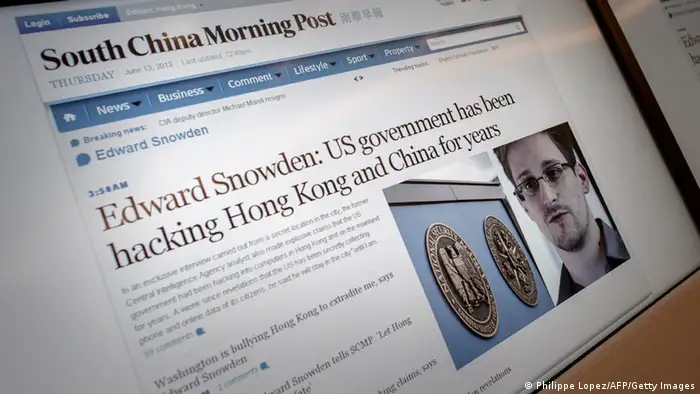 Screens show an edition of the South China Morning Post carrying the story of former US spy Edward Snowden (lower R) at the newspaper's offices in Hong Kong on June 13, 2013. Snowden broke his silence in an interview to the South China Morning Post on June 12, vowing to fight any bid to extradite him from Hong Kong and accusing Washington's cyber-troops of prying into hundreds of thousands of targets globally including many in China. AFP PHOTO / Philippe Lopez (Photo credit should read PHILIPPE LOPEZ/AFP/Getty Images)