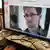 A picture of Edward Snowden, a contractor at the National Security Agency (NSA), is seen on a computer screen displaying a page of a Chinese news website (photo: REUTERS/Jason Lee)