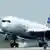 An Airbus A350-XWB plane lands after a test flight