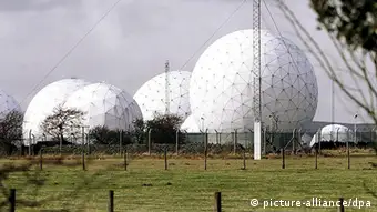 epa03748356 (FILE) A 24 February 2000 file photo shows what are believed to be electronic intelligence gathering antennas at the Royal Air Force Base Menwith Hill, near Harrogate, North Yorkshire, Britain. The facility is believed to be one of at least a dozen around the world that are part of the British Government Communications Headquarters (GCHQ) network. British intelligence services intercepted communications by delegates at two G20 summits in 2009 in London, the Guardian newspaper reported. Computers and telephones were monitored, the newspaper reported online late 16 June 2013, citing the former US intelligence official Edward Snowden and documents seen by its reporters. Some delegates were led to use internet cafes that had been set up to enable their messages to be tracked by Britain's CGHQ, the communications arm of the intelligence services. EPA/STR