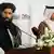 Muhammad Naeem (L), a spokesman for the Office of the Taliban of Afghanistan speaks during the opening of the Taliban Afghanistan Political Office in Doha June 18, 2013. The Afghan Taliban opened an office in Qatar on Tuesday to help restart talks on ending the 12-year-old war, saying it wanted a political solution that would bring about a just government and end foreign occupation. Taliban representative Mohammed Naeem told a news conference at the office in the capital Doha that the Islamist insurgency wanted good relations with Afghanistan's neighbouring countries. REUTERS/Mohammed Dabbous (QATAR - Tags: POLITICS)