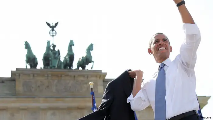 U.S. President Barack Obama waves after giving a speech in front of the Brandenburg Gate in Berlin June 19, 2013. Obama's first presidential visit to Berlin comes nearly 50 years to the day after John F. Kennedy landed in a divided Berlin at the height of the Cold War and told encircled westerners in the city Ich bin ein Berliner, a powerful signal that America would stand by them. REUTERS/MichaelKappeler/Pool (GERMANY - Tags: POLITICS )