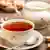 Tea cup on a rustic wooden table. #49953751 - Tea cup © Grafvision