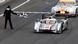 Denmark's Tom Kristensen, driving the Audi R18 E-Tron Quattro Number 2, crosses the finish line at the Le Mans 24-hour sportscar race in Le Mans, central France June 23, 2013. (Photo via REUTERS/Regis Duvignau) Denmark's Tom Kristensen, driving the Audi R18 E-Tron Quattro Number 2, crosses the finish line at the Le Mans 24-hour sportscar race in Le Mans, central France June 23, 2013. (Photo via REUTERS/Regis Duvignau)