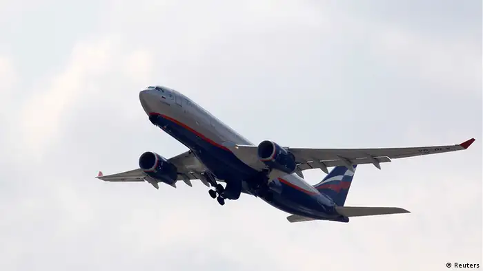 A plane en route to Cuba takes off from Moscow's Sheremetyevo airport, June 24, 2013. There was no sign that former U.S. spy agency contractor Edward Snowden was onboard a Russian plane bound for Cuba as it prepared to take off on Monday, a Reuters correspondent on the plane said. A flight attendant said Snowden was not on the plane and the seat he had been expected to occupy was taken by another passenger. REUTERS/Sergei Karpukhin (RUSSIA - Tags: POLITICS MEDIA)
