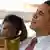 US Präsident Barack Obama hält in der Stadt Accra in Ghana ein Kind auf dem Arm. Foto: SHAWN THEW/dpa (zu dpa-KORR.: «Obama reist nach Afrika - USA wollen am Boom teilhaben » vom 24.06.2013)