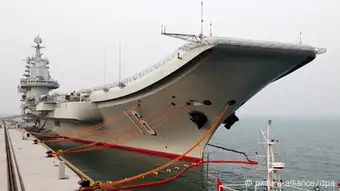 ©ChinaFotoPress/MAXPPP - UNSPECIFIED - CHINA: (CHINA OUT) Liaoning aircraft carrier berths at a naval base in China. (Photo by ChinaFotoPress)***_***440604335