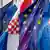 Croatian and the EU flags are seen at an intersection in Zagreb, (AP Photo/Darko Bandic)