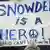 Plakat "Snowden is a hero" (Foto: Getty Images)