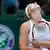 Sabine Lisicki of Germany reacts during her women's singles tennis match against Serena Williams of the U.S. at the Wimbledon Tennis Championships, in London July 1, 2013. REUTERS/Toby Melville (BRITAIN - Tags: SPORT TENNIS)