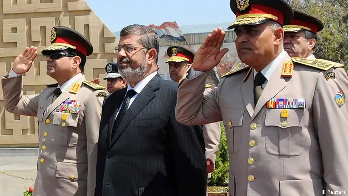 Ägyptens Verteidigungsminister Abdel Fattah al-Sisi und Mohamed Mursi