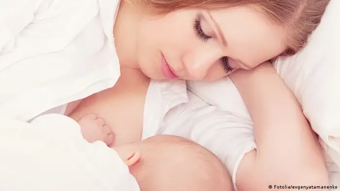 mother feeding breast her baby in the bed. sleeping together. #49278346 - mother feeding her baby in the bed. sleeping together © evgenyatamanenko