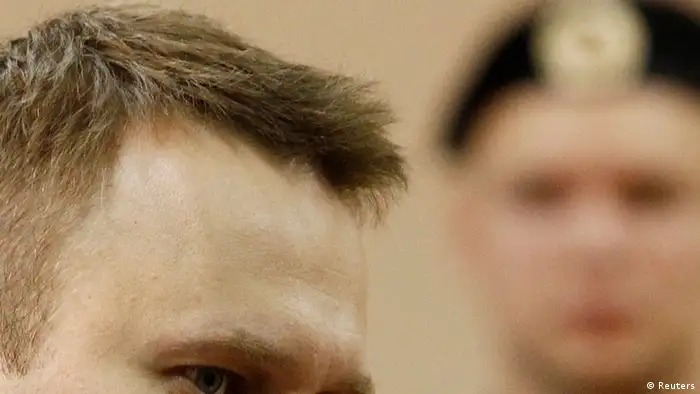 Russian opposition leader and anti-corruption blogger Alexei Navalny attends a court hearing in Kirov July 2, 2013. Russian state prosecutors demanded a six-year jail sentence on Friday for protest leader Navalny, one of President Vladimir Putin's biggest critics, on charges of theft. Picture taken July 2, 2013. REUTERS/Sergei Karpukhin (RUSSIA - Tags: CRIME LAW POLITICS)