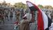 A supporter of ousted Egyptian President Mohamed Mursi waves an Egyptian flag in front of security personnel outside of the Republican Guard headquarters as Mursi supporters camp for the third day, in Cairo July 7, 2013. Thousands of supporters of Mursi protested outside his place of detention in Cairo on Sunday while a military-driven plan to resolve the political crisis remained mired in mistrust and confusion. REUTERS/Asmaa Waguih (EGYPT - Tags: POLITICS CIVIL UNREST A supporter of ousted Egyptian President Mohamed Mursi waves an Egyptian flag in front of security personnel outside of the Republican Guard headquarters as Mursi supporters camp for the third day, in Cairo July 7, 2013. Thousands of supporters of Mursi protested outside his place of detention in Cairo on Sunday while a military-driven plan to resolve the political crisis remained mired in mistrust and confusion. REUTERS/Asmaa Waguih (EGYPT - Tags: POLITICS CIVIL UNREST