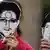 A person poses with a cardboard cut-out mask representing Edward Snowden's face