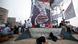Supporters of deposed Egyptian President Mohamed Mursi (pictured in poster) sleep at the Rabaa Adawiya square where they are camping in Cairo July 9, 2013. Egypt's interim head of state has set a speedy timetable for elections to drag the Arab world's biggest country from crisis, after the military ouster of Mursi last week sparked a wave of bloody protests. REUTERS/Khaled Abdullah (EGYPT - Tags: POLITICS CIVIL UNREST TPX IMAGES OF THE DAY) Supporters of deposed Egyptian President Mohamed Mursi (pictured in poster) sleep at the Rabaa Adawiya square where they are camping in Cairo July 9, 2013. Egypt's interim head of state has set a speedy timetable for elections to drag the Arab world's biggest country from crisis, after the military ouster of Mursi last week sparked a wave of bloody protests. REUTERS/Khaled Abdullah (EGYPT - Tags: POLITICS CIVIL UNREST TPX IMAGES OF THE DAY)