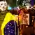 Brasilianische Demonstranten mit Masken und Flagge SIMON/AFP/Getty Images)