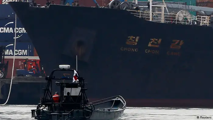 North Korean container ship ''Chong Chon Gang'' docks at the Manzanillo International Container Terminal in Colon City July 16, 2013. Panama detained the North Korean-flagged ship from Cuba as it headed to the Panama Canal and said it was hiding weapons in brown sugar containers, sparking a standoff in which the ship's captain attempted to commit suicide. REUTERS/Carlos Jasso (PANAMA - Tags: MILITARY MARITIME)