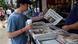 A man buys a newspaper displaying the news of the Royal birth by Britain's Catherine, Duchess of Cambridge in central London, July 23, 2013. Already touted as one of the most famous babies in the world, the first child of Prince William and wife Kate faces a life in the spotlight like no previous royal, severely testing the couple's desire to give their offspring a "normal" life. REUTERS/Paul Hackett (BRITAIN - Tags: ROYALS ENTERTAINMENT MEDIA HEALTH) A man buys a newspaper displaying the news of the Royal birth by Britain's Catherine, Duchess of Cambridge in central London, July 23, 2013. Already touted as one of the most famous babies in the world, the first child of Prince William and wife Kate faces a life in the spotlight like no previous royal, severely testing the couple's desire to give their offspring a "normal" life. REUTERS/Paul Hackett (BRITAIN - Tags: ROYALS ENTERTAINMENT MEDIA HEALTH)