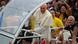 Pope Francis greets the crowd of faithful from his popemobile in downtown Rio de Janeiro, July 22, 2013. Pope Francis touched down in Rio de Janeiro on Monday, starting his first foreign trip as pontiff and a weeklong series of events expected to attract more than a million people to a gathering of young faithful in Brazil, home to the world's largest Roman Catholic population. REUTERS/Ueslei Marcelino (BRAZIL - Tags: RELIGION POLITICS) Pope Francis greets the crowd of faithful from his popemobile in downtown Rio de Janeiro, July 22, 2013. Pope Francis touched down in Rio de Janeiro on Monday, starting his first foreign trip as pontiff and a weeklong series of events expected to attract more than a million people to a gathering of young faithful in Brazil, home to the world's largest Roman Catholic population. REUTERS/Ueslei Marcelino (BRAZIL - Tags: RELIGION POLITICS)