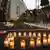Kerzen stehen am 23.07.2013 nahe der Gedenkstätte der Loveparade in Duisburg (Nordrhein-Westfalen) am Jahrestag der Katastrophe. Drei Jahre nach dem Loveparade-Unglück haben die Hinterbliebenen zum «Tag der 1000 Lichter» aufgerufen. Foto: Roland Weihrauch/DPA +++(c) dpa - Bildfunk+++ pixel