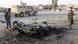 An Iraqi soldier (L) inspects the wreck of a car bomb after it exploded in the military zone of the northern Iraqi city of Kirkuk on July 11, 2013. Militants killed 25 Iraqi security forces members in a wave of attacks and 15 people died in other attacks, including 10 in twin bombings targeting mourners, officials said. AFP PHOTO MARWAN IBRAHIM (Photo credit should read MARWAN IBRAHIM/AFP/Getty Images) An Iraqi soldier (L) inspects the wreck of a car bomb after it exploded in the military zone of the northern Iraqi city of Kirkuk on July 11, 2013. Militants killed 25 Iraqi security forces members in a wave of attacks and 15 people died in other attacks, including 10 in twin bombings targeting mourners, officials said. AFP PHOTO MARWAN IBRAHIM (Photo credit should read MARWAN IBRAHIM/AFP/Getty Images)