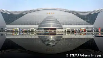 The 'New Century Global Centre' building opens to the public in Chengdu, southwest China's Sichuan province on June 28, 2013. The center, claimed by Chinese officials to be 'the world's largest standalone structure', measuring 500 metres in length and 400 metres in width, with 1.7 million square metres of floor space -- big enough to hold 20 Sydney Opera Houses -- is the latest symbol of China's economic boom. CHINA OUT AFP PHOTO (Photo credit should read STR/AFP/Getty Images)