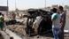 Iraqis inspect the site of a car bomb explosion in Sadr City in Baghdad AFP PHOTO/AHMAD AL-RUBAYE (Photo credit should read AHMAD AL-RUBAYE/AFP/Getty Images) Iraqis inspect the site of a car bomb explosion in Sadr City in Baghdad AFP PHOTO/AHMAD AL-RUBAYE (Photo credit should read AHMAD AL-RUBAYE/AFP/Getty Images)