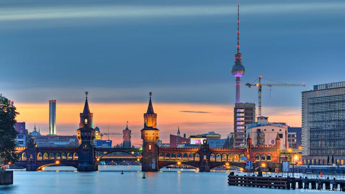 The Berlin cityscape in the evening, taking in the TV Tower and Oberbaum Bridge 