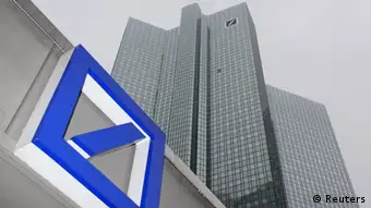 File photo of a Deutsche Bank logo in front of the Deutsche Bank headquarters in Frankfurt February 24, 2011. Financial data company Markit, the International Swaps and Derivatives Association (ISDA) and 13 banks were charged July 1, 2013, with blocking two exchanges from entering the credit derivatives market in the last decade in breach of EU antitrust rules. The European Commission said the group, which included Citigroup, Goldman Sachs and UBS, shut out Deutsche Boerse and the Chicago Mercantile Exchange from the CDS business between 2006 and 2009. The charges followed a two-year investigation. The other banks charged are Bank of America Merrill Lynch, Barclays, Bear Stearns, BNP Paribas, Morgan Stanley, Credit Suisse, Deutsche Bank, HSBC, JP Morgan and RBS. REUTERS/Ralph Orlowski/Files (GERMANY - Tags: BUSINESS)