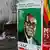 Election campaign posters are pictured near Zimbabweans walking on a street blocked by uncollected garbage in Harare July 17, 2013. President Robert Mugabe's rivals said on Wednesday the chaotic organisation of early voting for soldiers and police showed Zimbabwe was not ready for a July 31 general election in which more than six million people are registered to vote. Mugabe's main rival, Prime Minister Morgan Tsvangirai, told a rally that the long queues seen during two days of special voting for 70,000 police officers and soldiers clearly showed the Zimbabwe Electoral Commission (ZEC) was ill-prepared. REUTERS/Philimon Bulawayo (ZIMBABWE - Tags: POLITICS ELECTIONS)