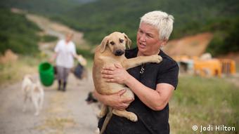 Semra Tecimen with a sick puppy (photo: Jodi Hilton)