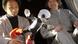 An undated handout image shows Kirobo, a 34cm high talking robot, during a zero-gravity test with robot's developer, Tomotaka Takahashi (L) and Fuminori Kataoka (R), project general manager from Toyota Motor Corp. For the first time in the world on 04 August 2013, An undated handout image shows Kirobo, a 34cm high talking robot, during a zero-gravity test with robot's developer, Tomotaka Takahashi (L) and Fuminori Kataoka (R), project general manager from Toyota Motor Corp. For the first time in the world on 04 August 2013,