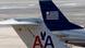 American Airlines and US Airways jets prepare for flight at a gate at the Philadelphia International Airport (Photo: AP Photo/Matt Rourke, File) American Airlines and US Airways jets prepare for flight at a gate at the Philadelphia International Airport (Photo: AP Photo/Matt Rourke, File)