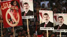 أنصار مرسي يحتفلون بالعيد في الشوارع ويرفضون فض اعتصامهم