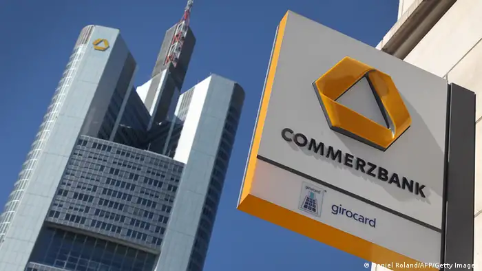 FILES - Picture taken on April 7, 2011 shows the logo of the German bank Commerzbank on a branch (R) and the headquarters (L) of the bank in Frankfurt/Main, western Germay. Germany's second biggest bank, Commerzbank, issued on August 10, 2011 a veiled profit warning for this year and next owing to the public debt crisis that has rocked financial markets. AFP PHOTO / DANIEL ROLAND (Photo credit should read DANIEL ROLAND/AFP/Getty Images)