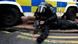 A police officer is tended to by a colleague after Loyalist protesters attacked the police with bricks and bottles as they waited for a republican parade to make its way through Belfast City Centre, August 9, 2013. Police fired plastic bullets and water cannon at rioters in the heart of Belfast on Friday after being pelted by missiles for the second successive night in the latest bout of Northern Ireland's sporadic sectarian violence. Police said two officers were injured. Eight were hurt the previous night when a crowd threw paint bombs, bottles and masonry at police. REUTERS/Cathal McNaughton (NORTHERN IRELAND - Tags: CIVIL UNREST CRIME LAW TPX IMAGES OF THE DAY) A police officer is tended to by a colleague after Loyalist protesters attacked the police with bricks and bottles as they waited for a republican parade to make its way through Belfast City Centre, August 9, 2013. Police fired plastic bullets and water cannon at rioters in the heart of Belfast on Friday after being pelted by missiles for the second successive night in the latest bout of Northern Ireland's sporadic sectarian violence. Police said two officers were injured. Eight were hurt the previous night when a crowd threw paint bombs, bottles and masonry at police. REUTERS/Cathal McNaughton (NORTHERN IRELAND - Tags: CIVIL UNREST CRIME LAW TPX IMAGES OF THE DAY)