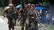 Philippinsche Truppen marschieren die Straße entlang (Foto: AFP) Philippinsche Truppen marschieren die Straße entlang (Foto: AFP)