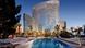 A Las Vegas hotel, with swimming pool in the foreground A Las Vegas hotel, with swimming pool in the foreground