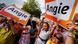 Supporters of German Chancellor Angela Merkel hold up placards during a election campaign rally in Seligenstadt near Frankfurt August 14, 2013. Returning from a three week vacation, Merkel officially launched her campaign in Seligenstadt near Frankfurt and for a third term as leader in September's election. REUTERS/Ralph Orlowski (GERMANY - Tags: POLITICS ELECTIONS TPX IMAGES OF THE DAY) Supporters of German Chancellor Angela Merkel hold up placards during a election campaign rally in Seligenstadt near Frankfurt August 14, 2013. Returning from a three week vacation, Merkel officially launched her campaign in Seligenstadt near Frankfurt and for a third term as leader in September's election. REUTERS/Ralph Orlowski (GERMANY - Tags: POLITICS ELECTIONS TPX IMAGES OF THE DAY)