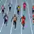 Usain Bolt of Jamaica (center L) leads Justin Gatlin of the U.S. (center R) and other athletes in their men's 4x100 metres relay final during the IAAF World Athletics Championships at the Luzhniki stadium in Moscow August 18, 2013. REUTERS/Phil Noble (RUSSIA - Tags: SPORT ATHLETICS)