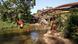 FILE: A picture dated August 12, 2011 shows kids swimming in oil pipelines in a river of Sacha, in Orellana province, near to the Yasuni National Park in Ecuador. Ecuador proposed to keep untapped oil reserves in the ITT (Ishpingo-Tambococha-Tiputini) in Yasuni National Park, in exchange of the international community to contribute financially to at least 50% of the resources that the state would receive if opt for oil exploration. A delegation of four German parliamentarians visitet on October 9, 2011 the Yasuni National Park in the Ecuadorian Amazon. Photo: Eduardo Leon/dpa FILE: A picture dated August 12, 2011 shows kids swimming in oil pipelines in a river of Sacha, in Orellana province, near to the Yasuni National Park in Ecuador. Ecuador proposed to keep untapped oil reserves in the ITT (Ishpingo-Tambococha-Tiputini) in Yasuni National Park, in exchange of the international community to contribute financially to at least 50% of the resources that the state would receive if opt for oil exploration. A delegation of four German parliamentarians visitet on October 9, 2011 the Yasuni National Park in the Ecuadorian Amazon. Photo: Eduardo Leon/dpa
